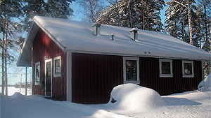 Bungalow coverd with snow. Click for a bigger image